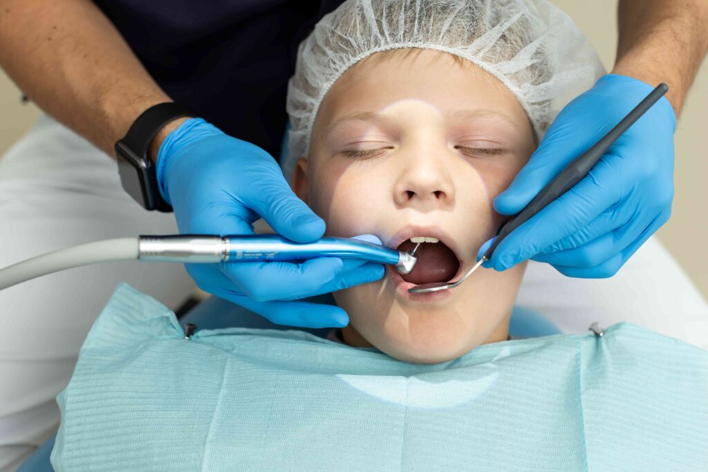 Boy under anesthesia getting dental work